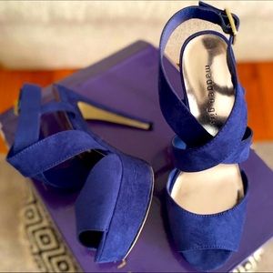 Steve Madden strapped heels.